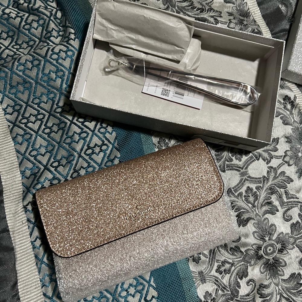 Kate Spade new in box glitter rose gold medium phone wristlet